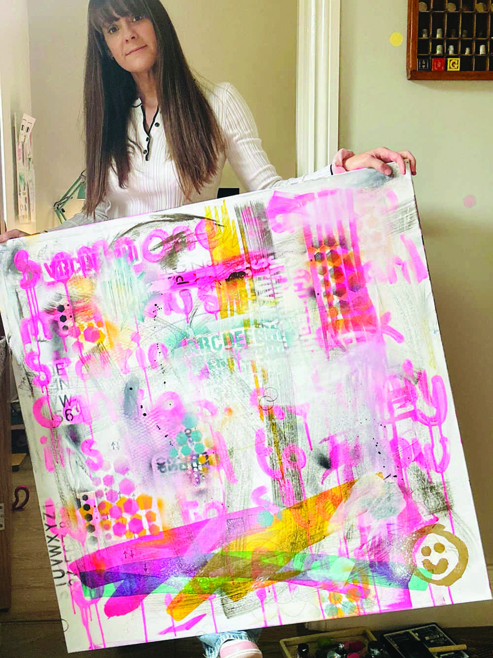 Woman Holding Large Canvas Art Work